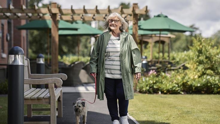 a person walking a dog