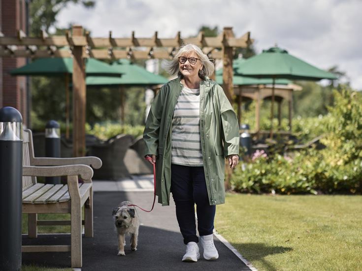 a person walking a dog