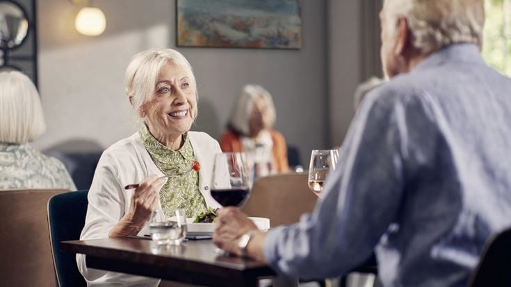 a woman and a man having a conversation