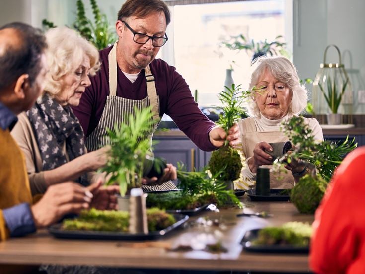 a group of people around a table