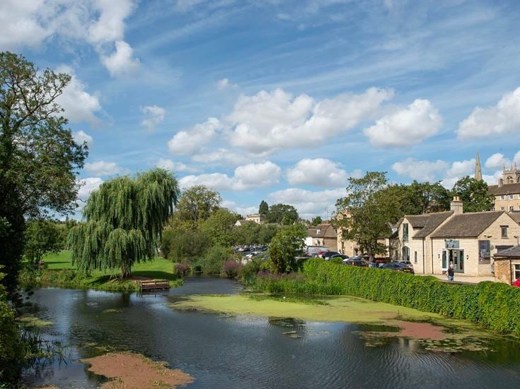 The banks of the River Welland and meadows in the market town of Stamford.