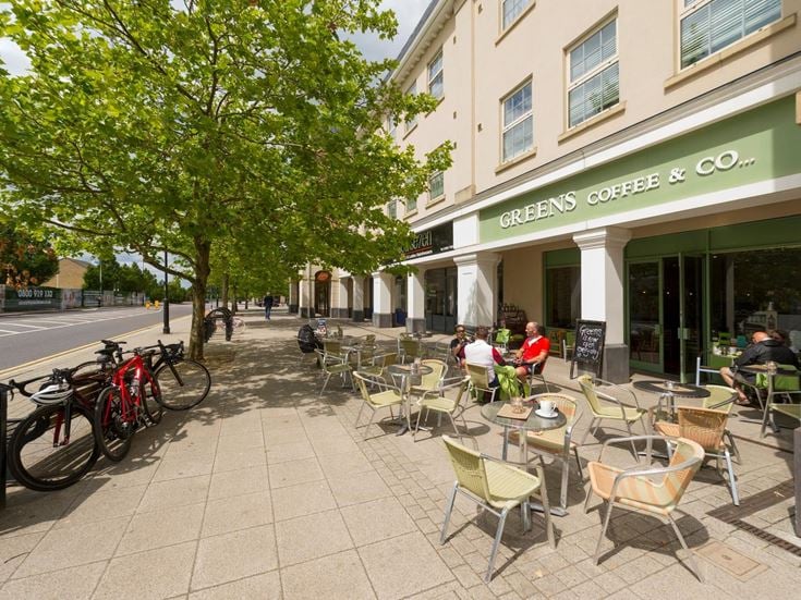 A row of cafés and shops in Cambourne.