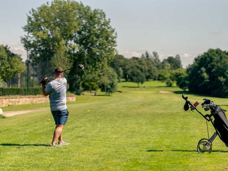 a person playing golf