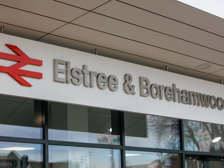 Elmstree and Borehamwood railway station sign and entrance.
