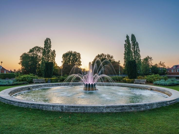 a fountain in a park