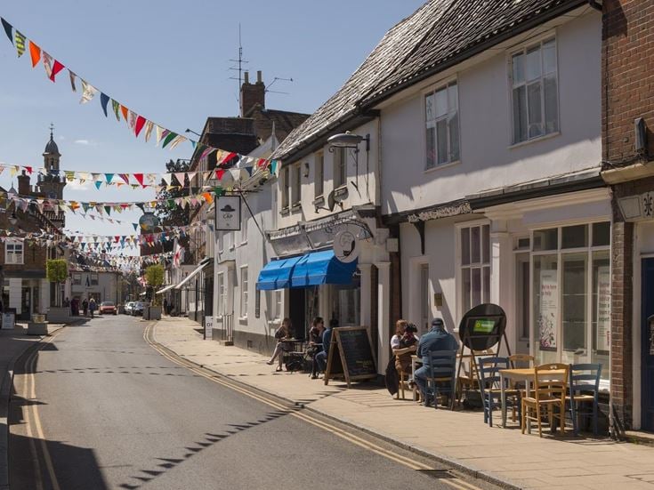 A terraced row of shops and cafés in Harleston, Norfolk