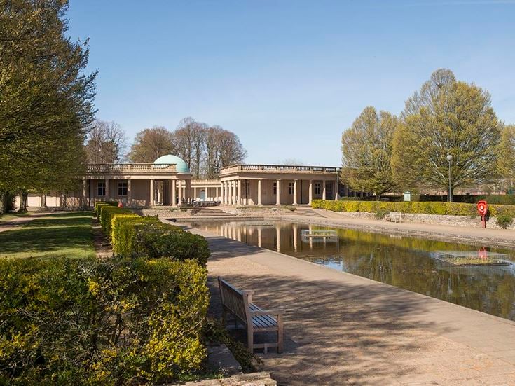 Elegant grade II listed pavillion at Eaton Park and lily pond.