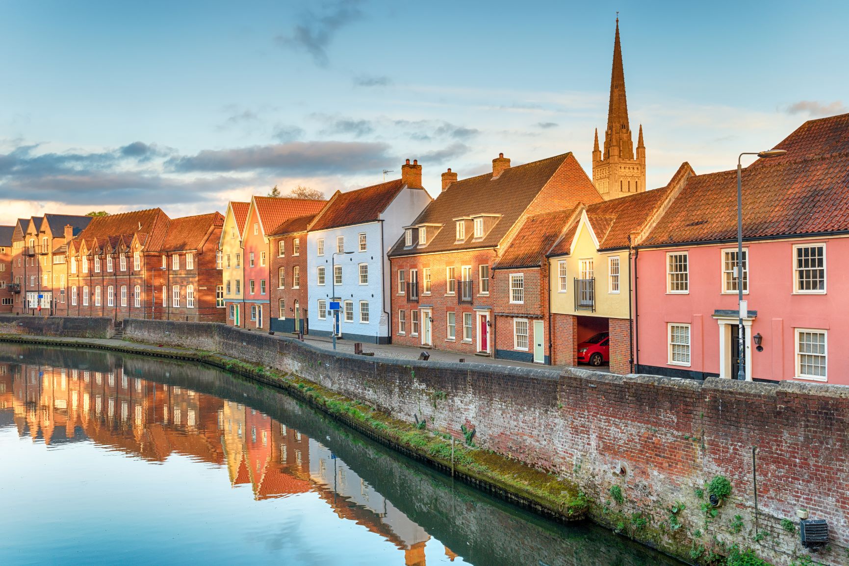A scenic row of houses along the waterfront in Norwich.’
