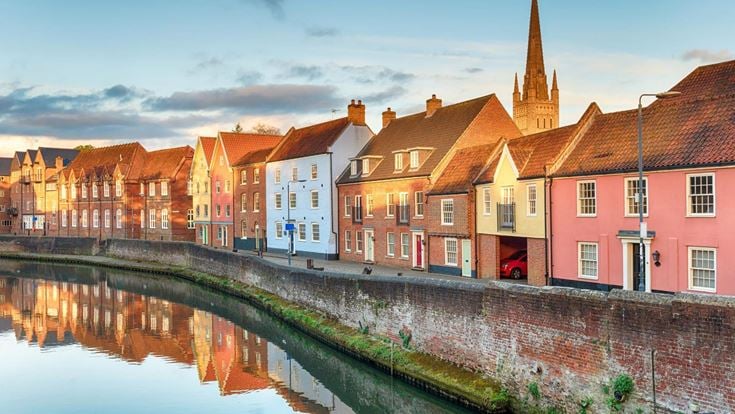 A scenic row of houses along the waterfront in Norwich.’