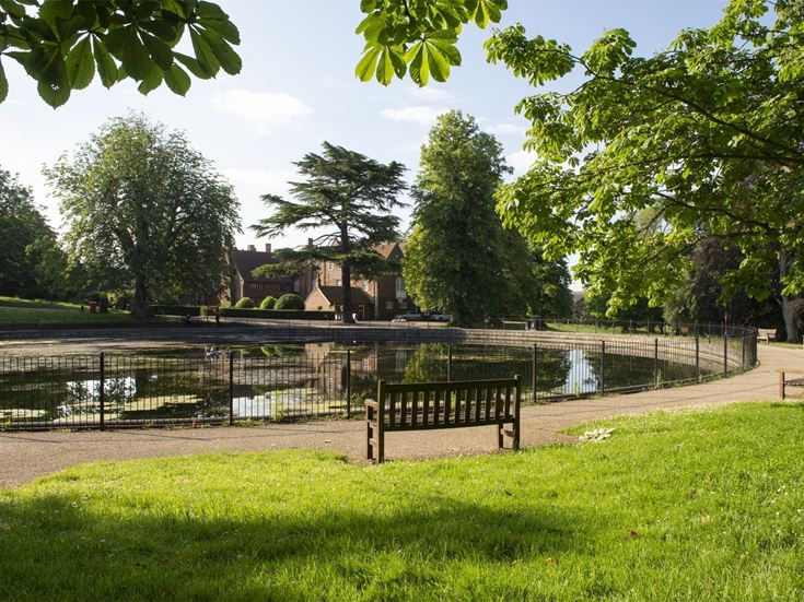 A park in Ipswich Suffolk with benches