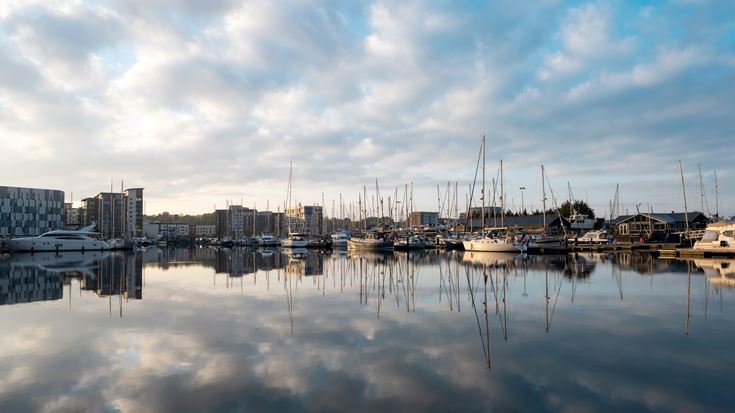 A dock full of sailboats at the iconic Waterfront in Ipswich.