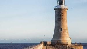 a lighthouse on a pier
