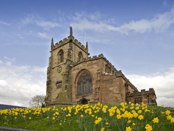 a stone building with a clock tower