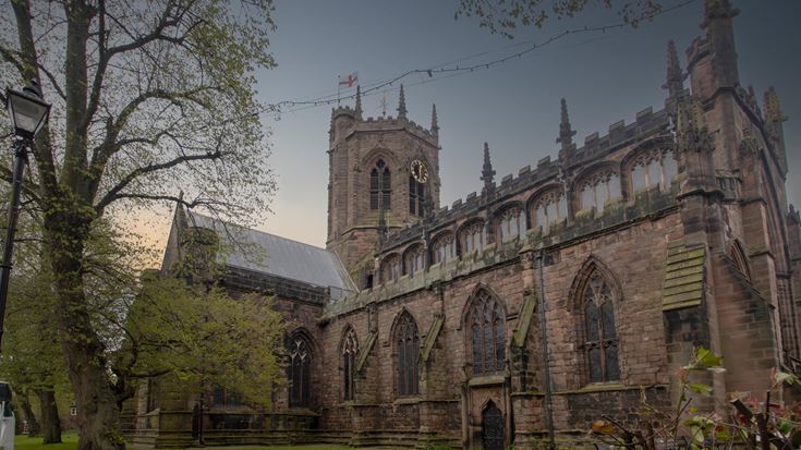a large stone building with towers