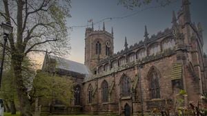 a large stone building with towers