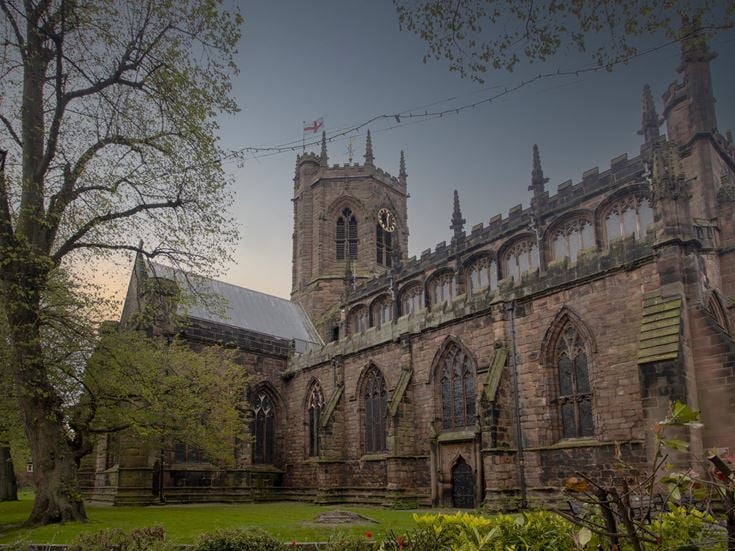 a large stone building with towers