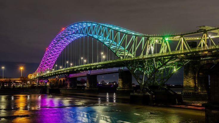 a bridge with lights at night