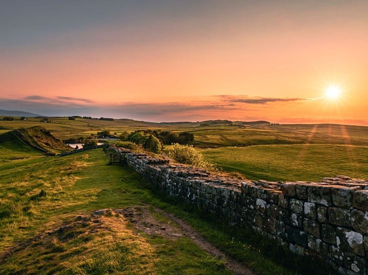 The view of the Hadrian's Wall in the sunset near Cawfield Quarry