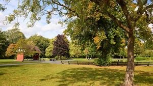 Cale Park in Davenport featuring mature trees, seating and level footpaths.