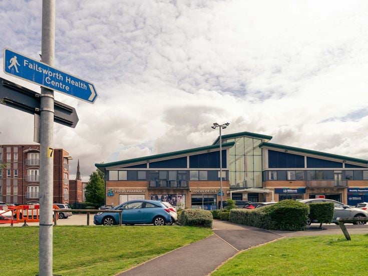 Failsworth health centre with a GP surgery, pharmacy, and mobility store.