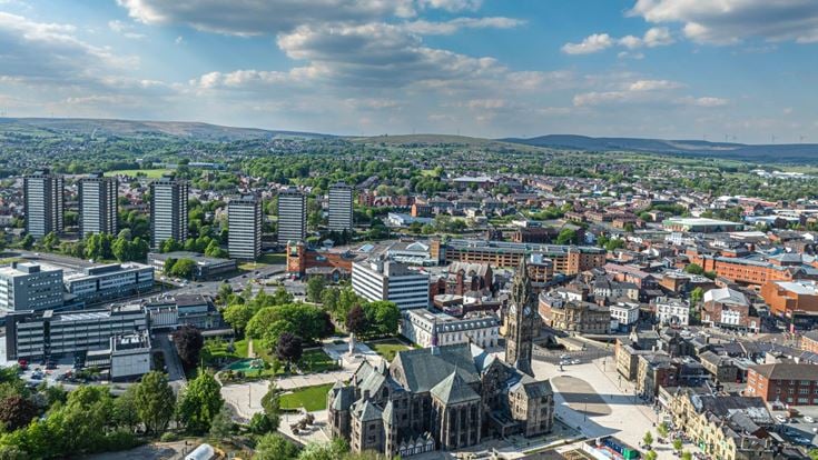 An aerial view of Rochdale with the Town Hall in foreground.