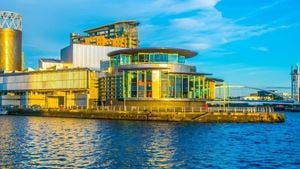 a building with a body of water in front of it