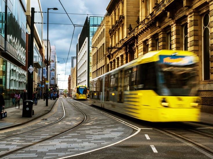 Yellow trams in Manchester Greater Manchester