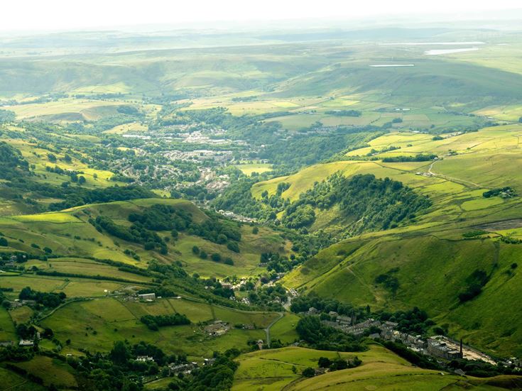 a landscape with green hills