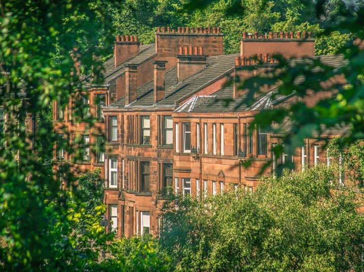 a building with trees around it