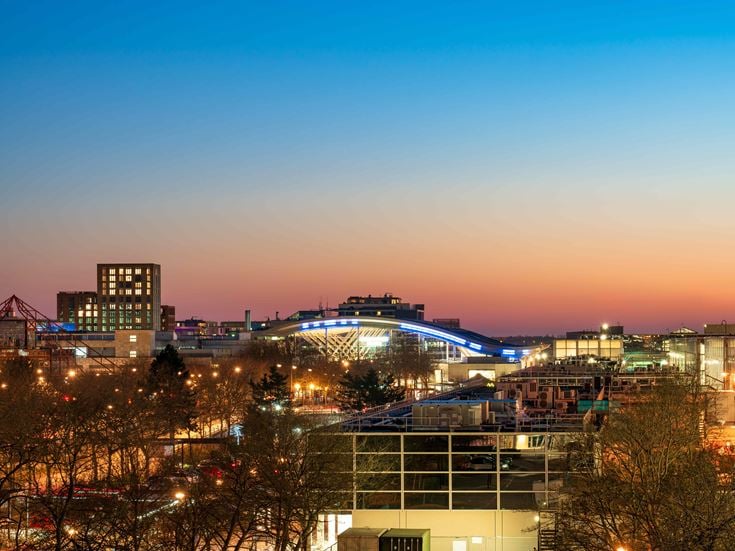Aerial view of Milton Keynes town centre at sunset.