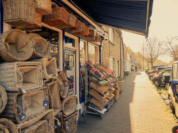 A shop in Olney with baskets for sale outside
