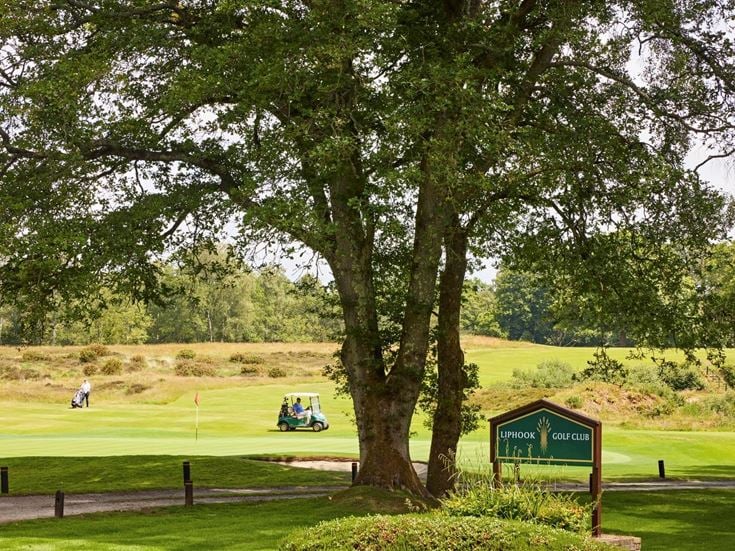 Senior golfers outside at Liphook Golf Club.
