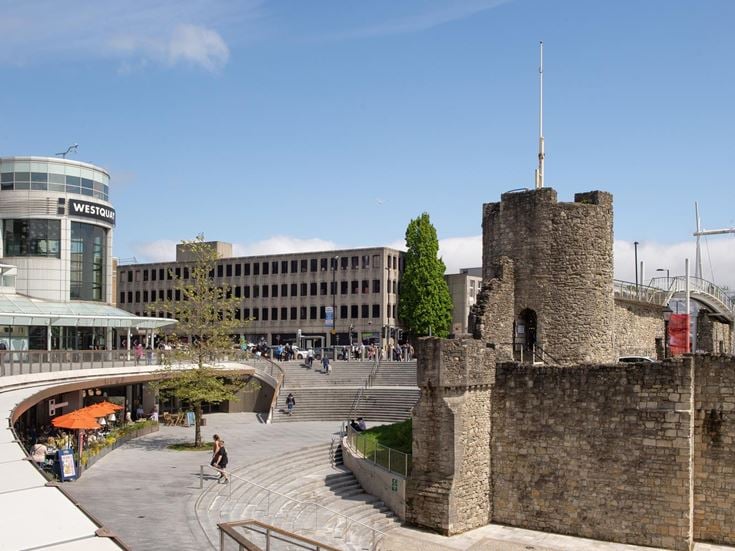 The medieval Arundel Tower next to the modern Westquays Shopping Centre in Southampton.