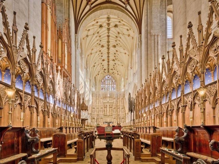 The grand choir area inside Winchester Cathedral.