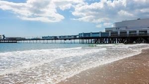 a pier with a building on the side