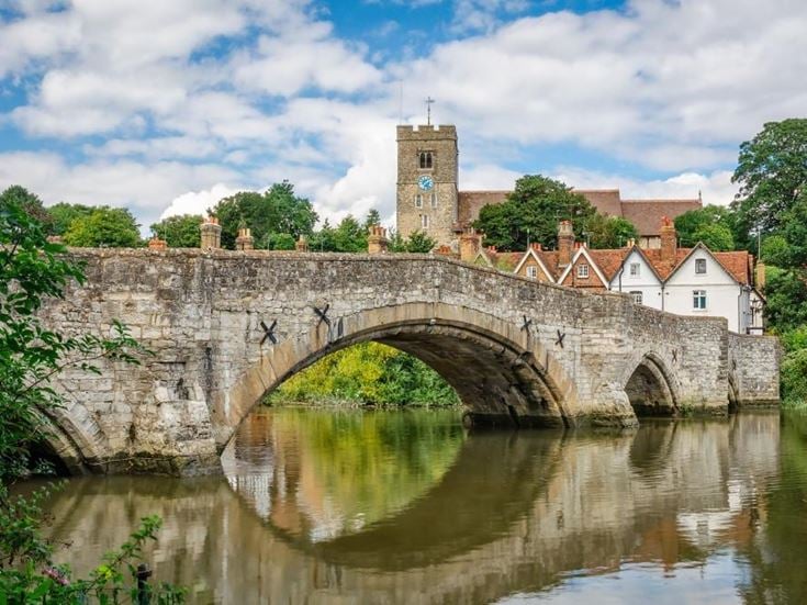 View of Aylesford village with medieval bridge and church in Kent