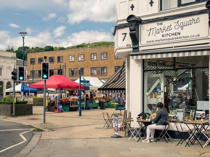 Market stalls and a cafe in the centre of Dover
