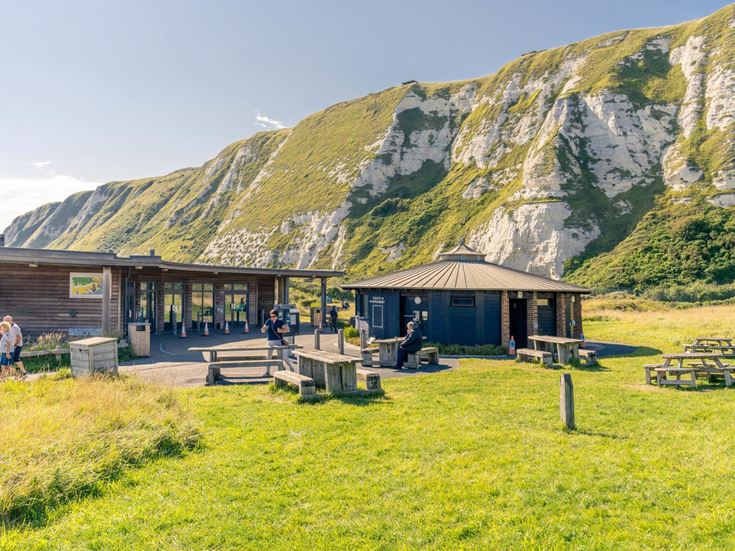A group of people outside of a building in Samphire Hoe, Dover