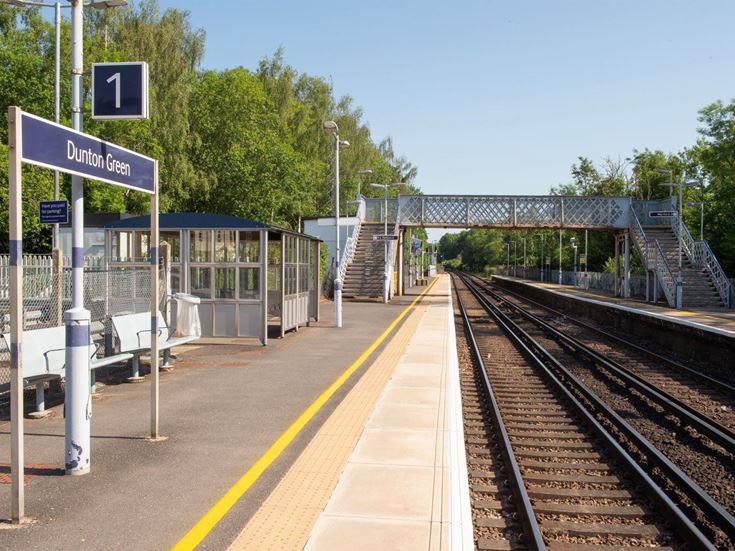 The platform and train tracks at Dunton Green railway station.