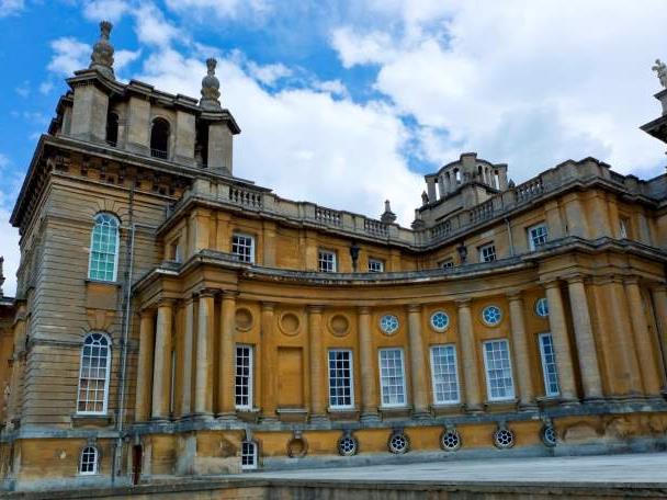 The stunning brick-walled and windowed exterior of Blenheim Palace in Woodstock.