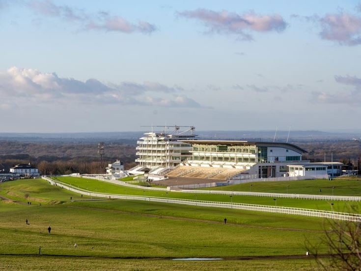 a large building with a large white building in the background