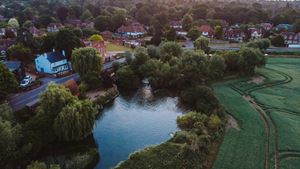a river with a small town