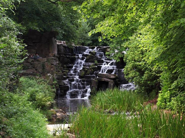 The Cascade waterfall at Virginia Water Lake in Windsor Great Park.