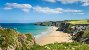 A view of the sandy beach from the cliff tops in Cornwall