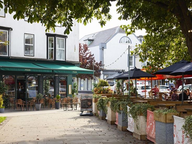 Outdoor dining areas for several restaurants in Exmouth town centre.
