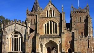 a large stone church with Hereford Cathedral in the background