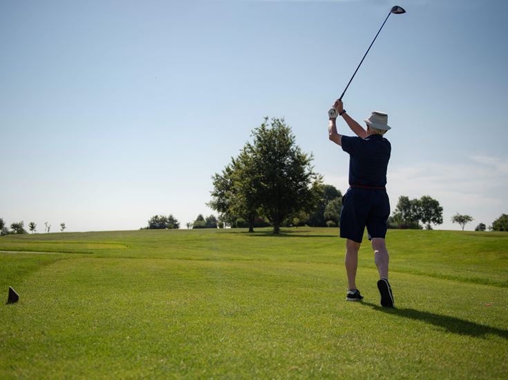 A retiree enjoying the local golf course in Blandford St Mary.