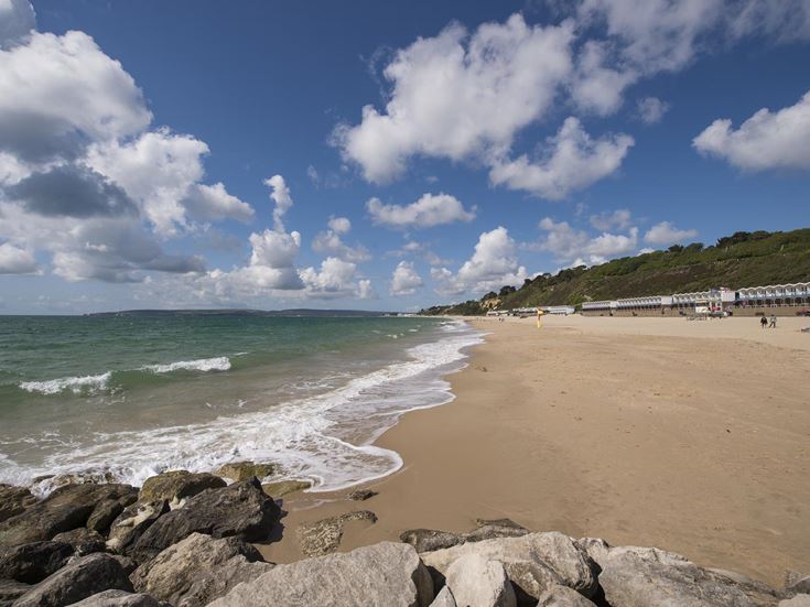 Sandbanks Beach on the Dorset coast, featuring wide sandy beaches and sea views.