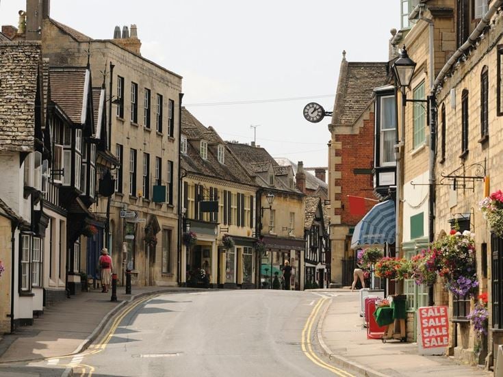 A terraced row of shops and local businesses in Stow-on-the-Wold.