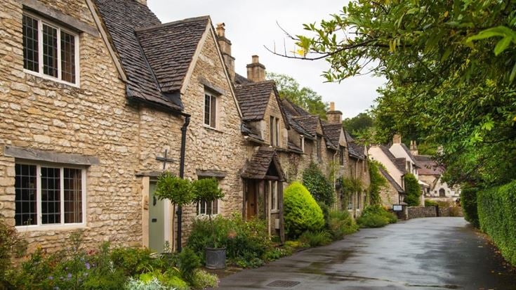 A road with houses in Castle Combe a unique old English village